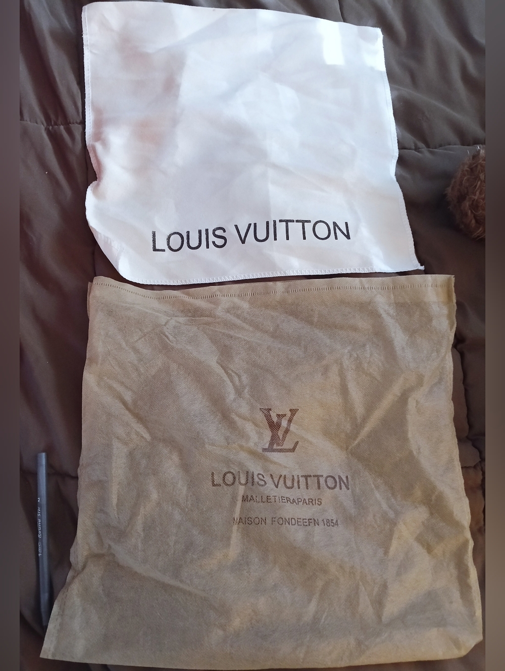 2 Louis Vuitton dust bags